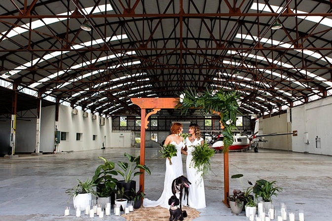 Matte Black and Greenery Wedding Inspiration in an Aircraft Hangar | Lyndal Carmichael Photography