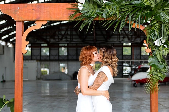 Matte Black and Greenery Wedding Inspiration in an Aircraft Hangar | Lyndal Carmichael Photography