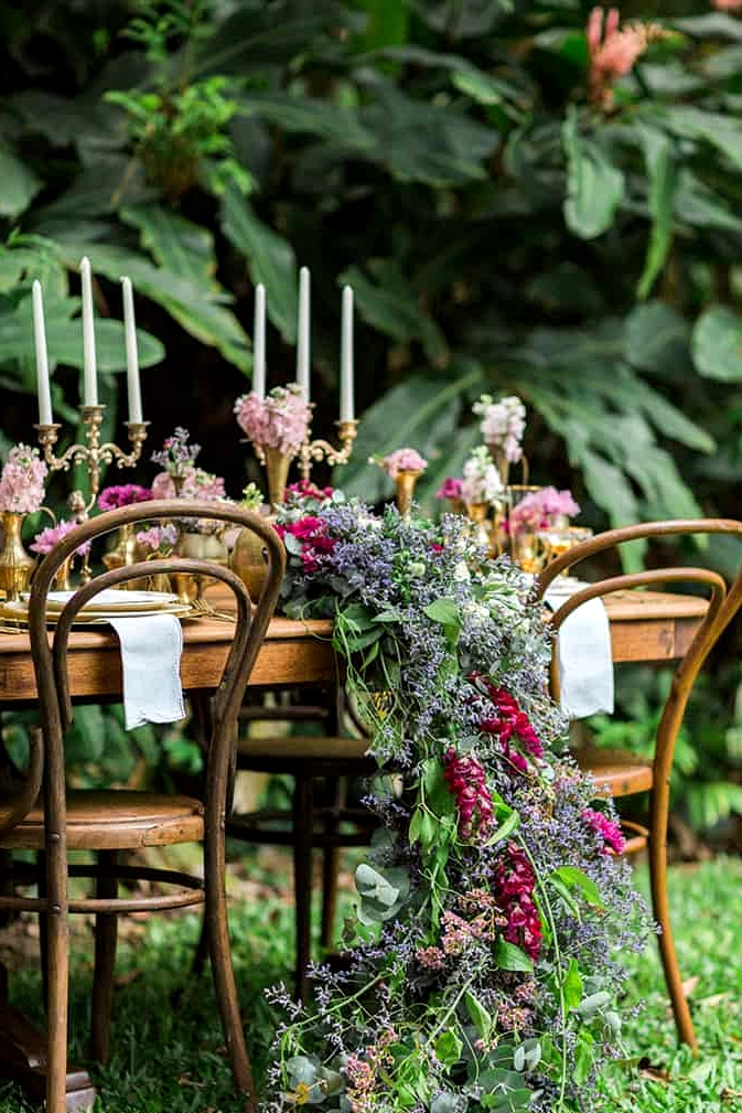 Vintage wedding reception table with cascading florals