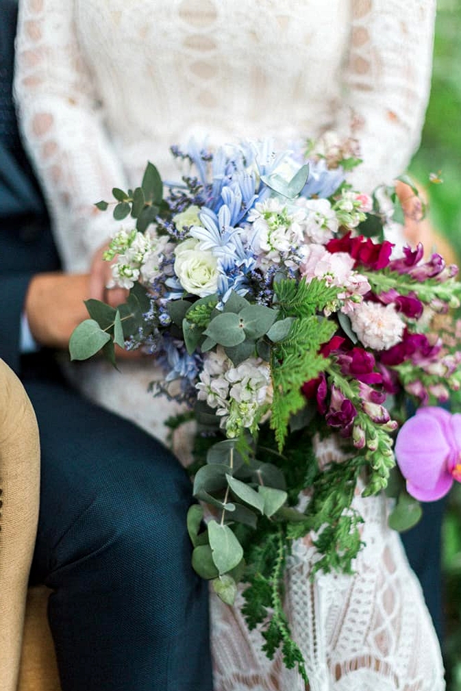 Gorgeous blue and pink wildflower bouquet with greenery