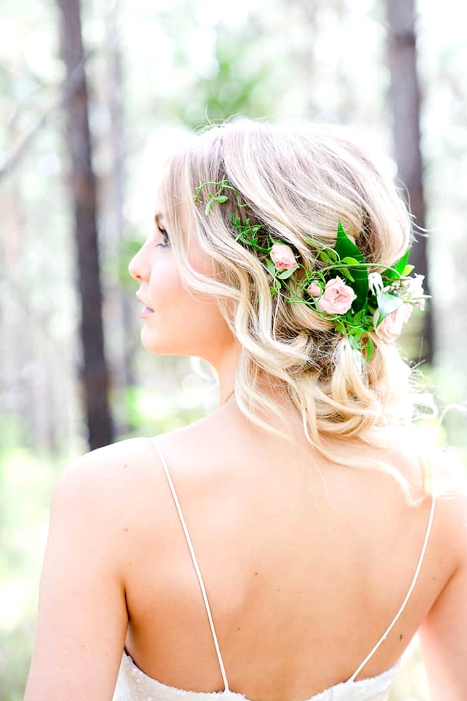 Romantic wedding hair with half halo of roses