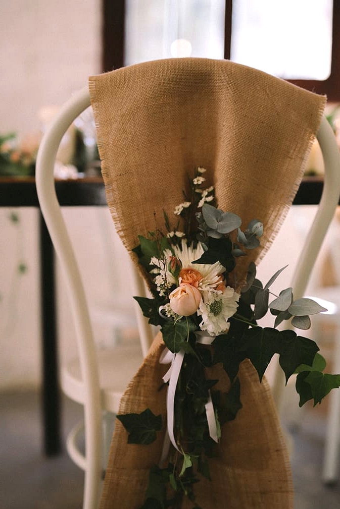 Relaxed-Vintage-Boho-Wedding-Inspiration-Reception-Chair-Back-Flowers-3