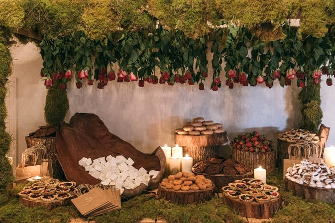 Woodland wedding reception dessert display table