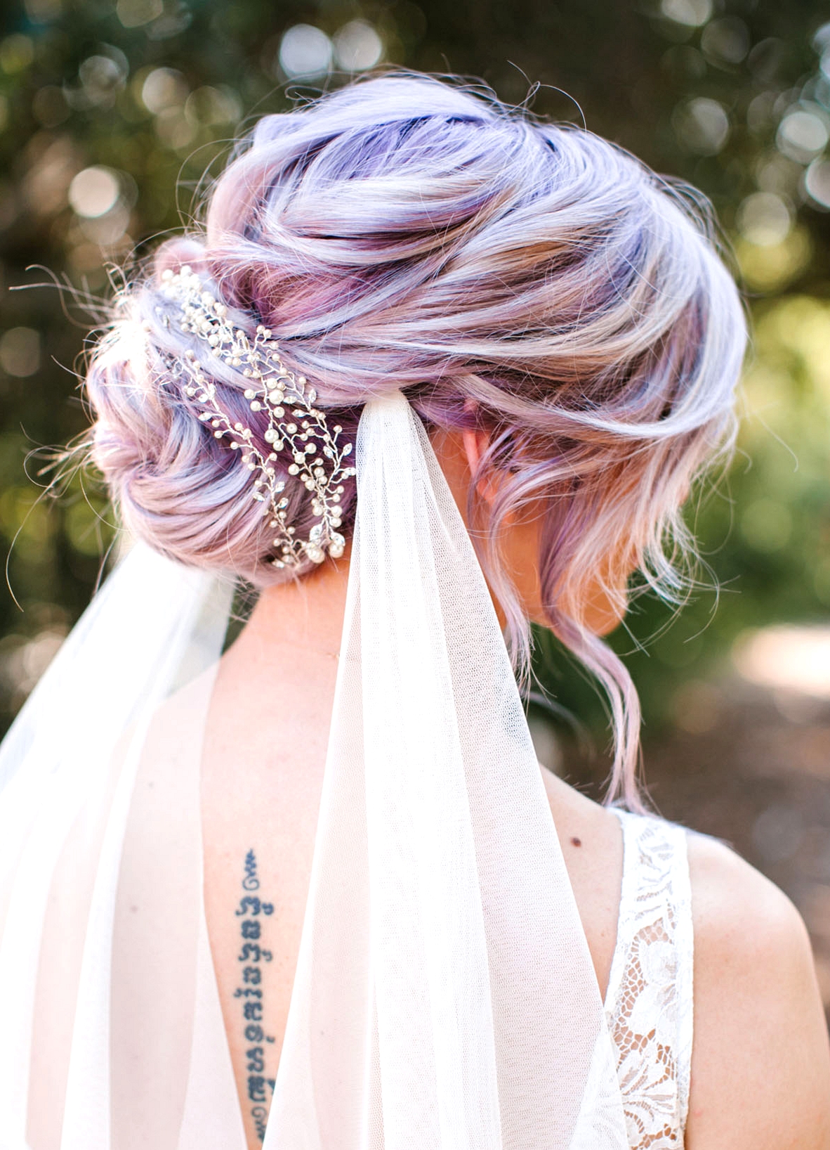 boho chic messy bun hairstyles for brides