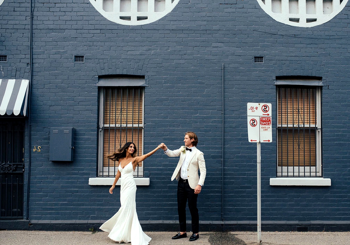 Dancing in the Streets in the Wyatt Gown by Lovers Society and Green Wedding Shoes