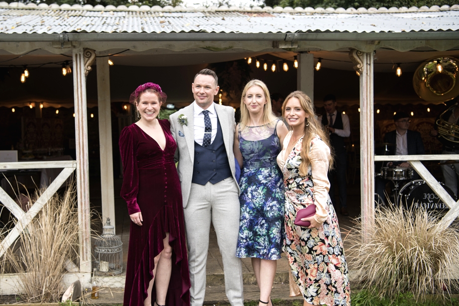 Eoin & Darran Real Wedding exterior guests happy smiling groom friends