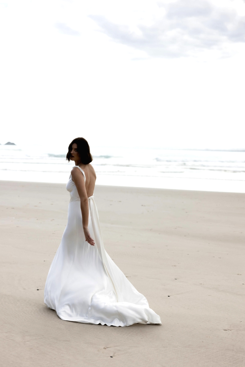 Bride on beach silk dress