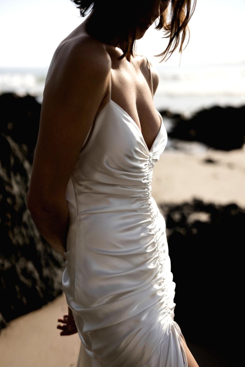 Bride on beach ruched silk wedding dress Karen Willis Holmes