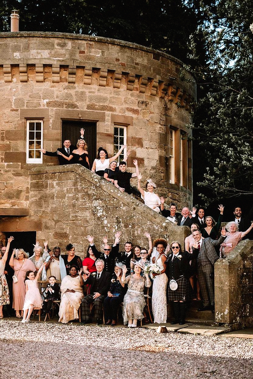 fun group shot photo at castle wedding