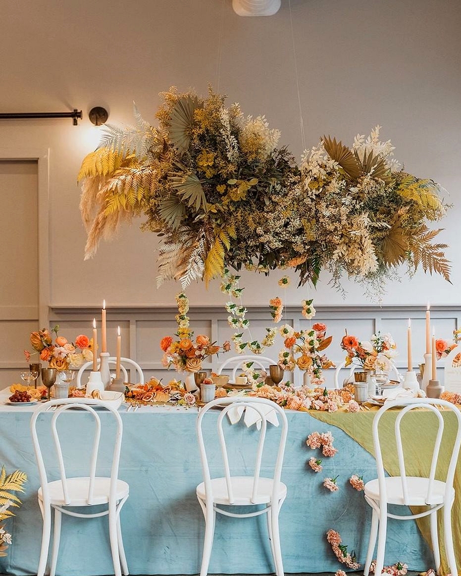 modern wedding table with silk linen draping