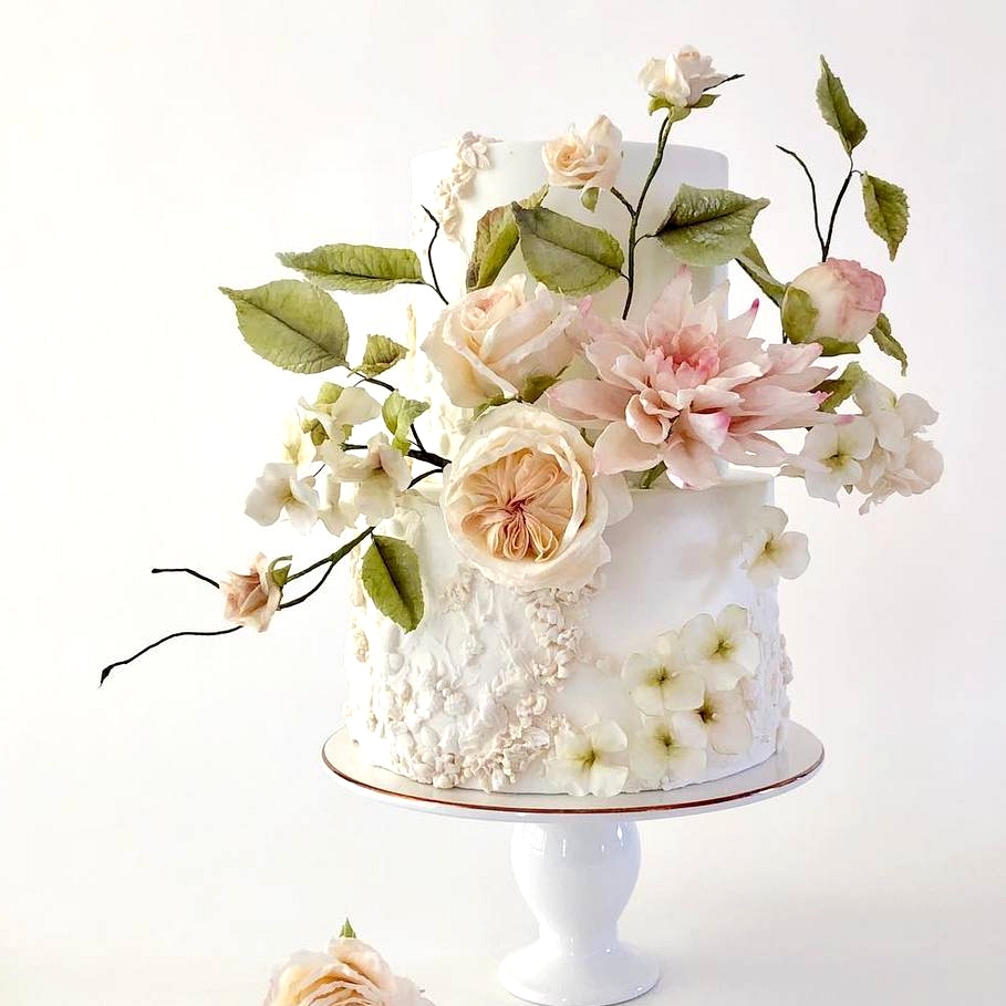 garden inspired wedding cake with pastel sugar flowers