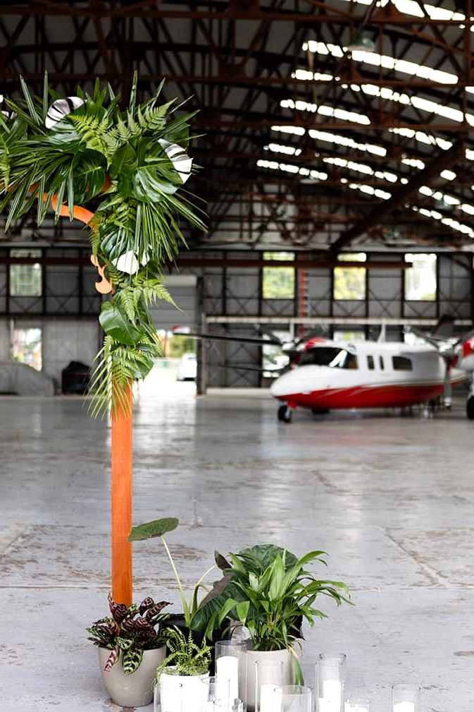 Matte Black and Greenery Wedding Inspiration in an Aircraft Hangar | Lyndal Carmichael Photography