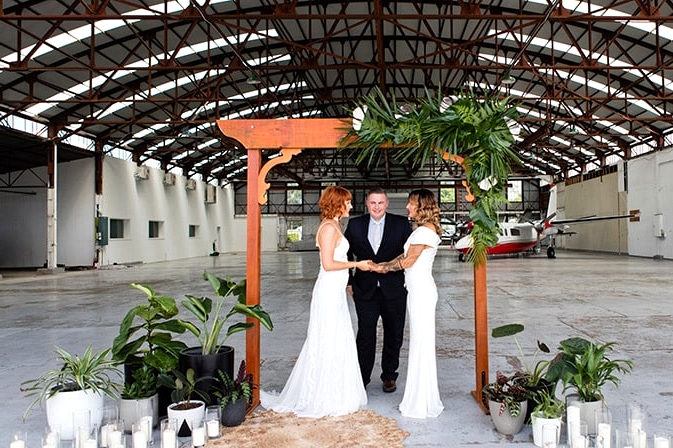 Matte Black and Greenery Wedding Inspiration in an Aircraft Hangar | Lyndal Carmichael Photography