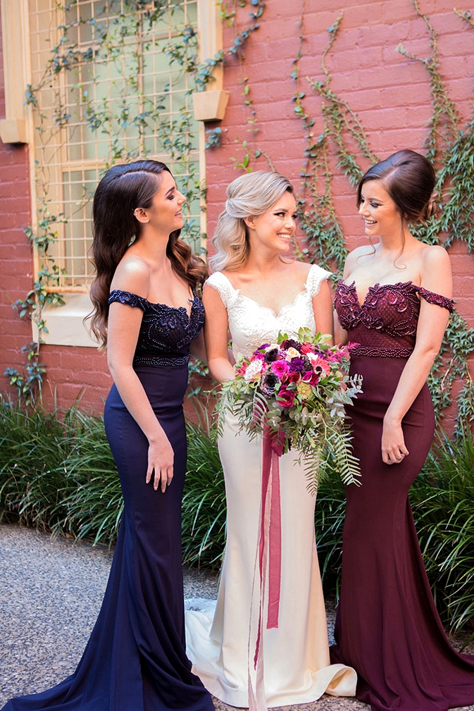 Elegant burgundy and navy off the shoulder bridesmaid dresses | Lola Images