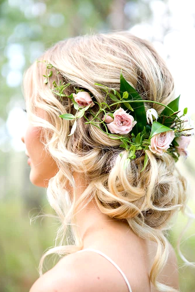 Romantic wedding hair with half halo of roses