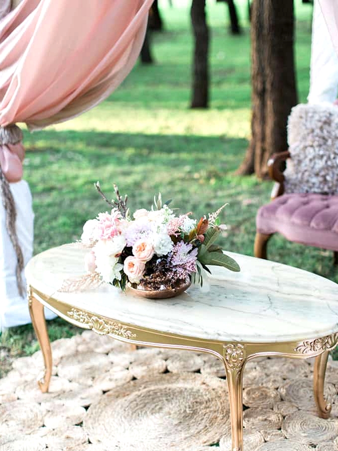 Gold and marble coffee table and pastel florals