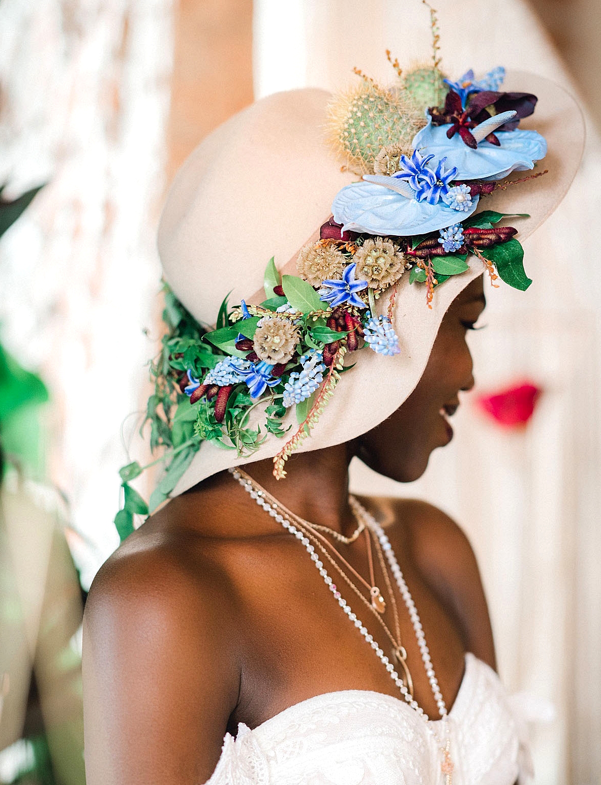 hat with fresh flowers