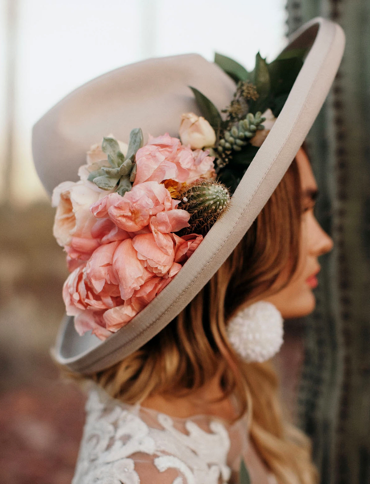 hat with fresh flowers