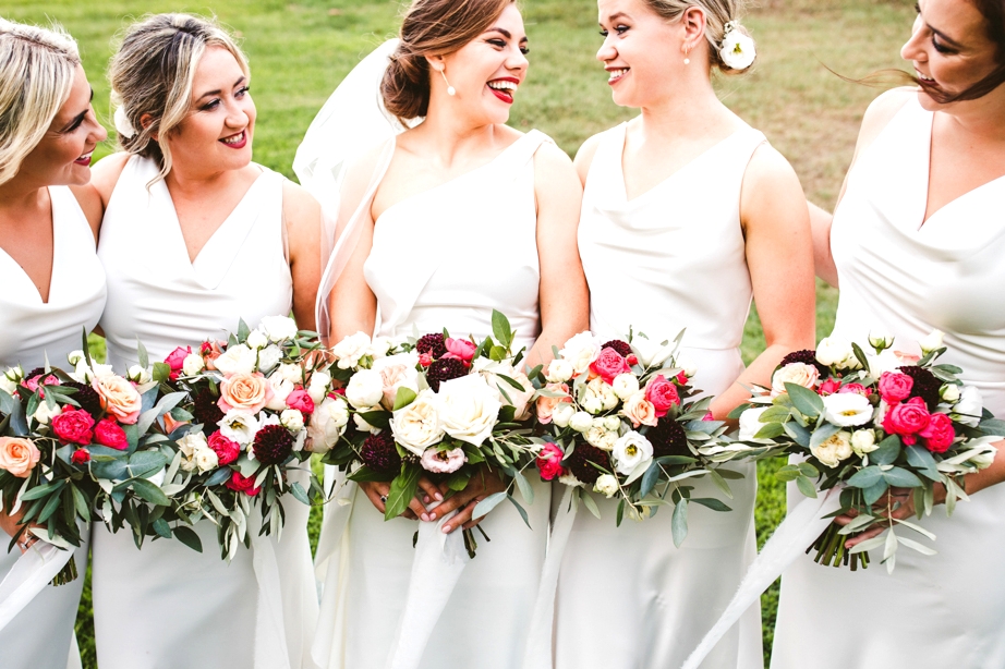 Bridesmaids photography photo roses flowers bouquet smiling laughing